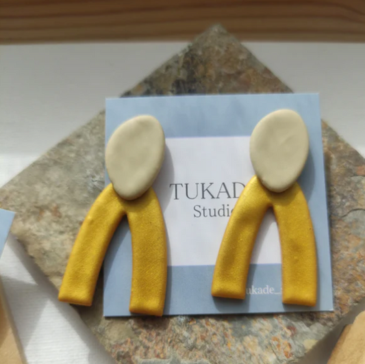 Simona -  Boucles d'oreilles allongées en forme de pont blanche et doré